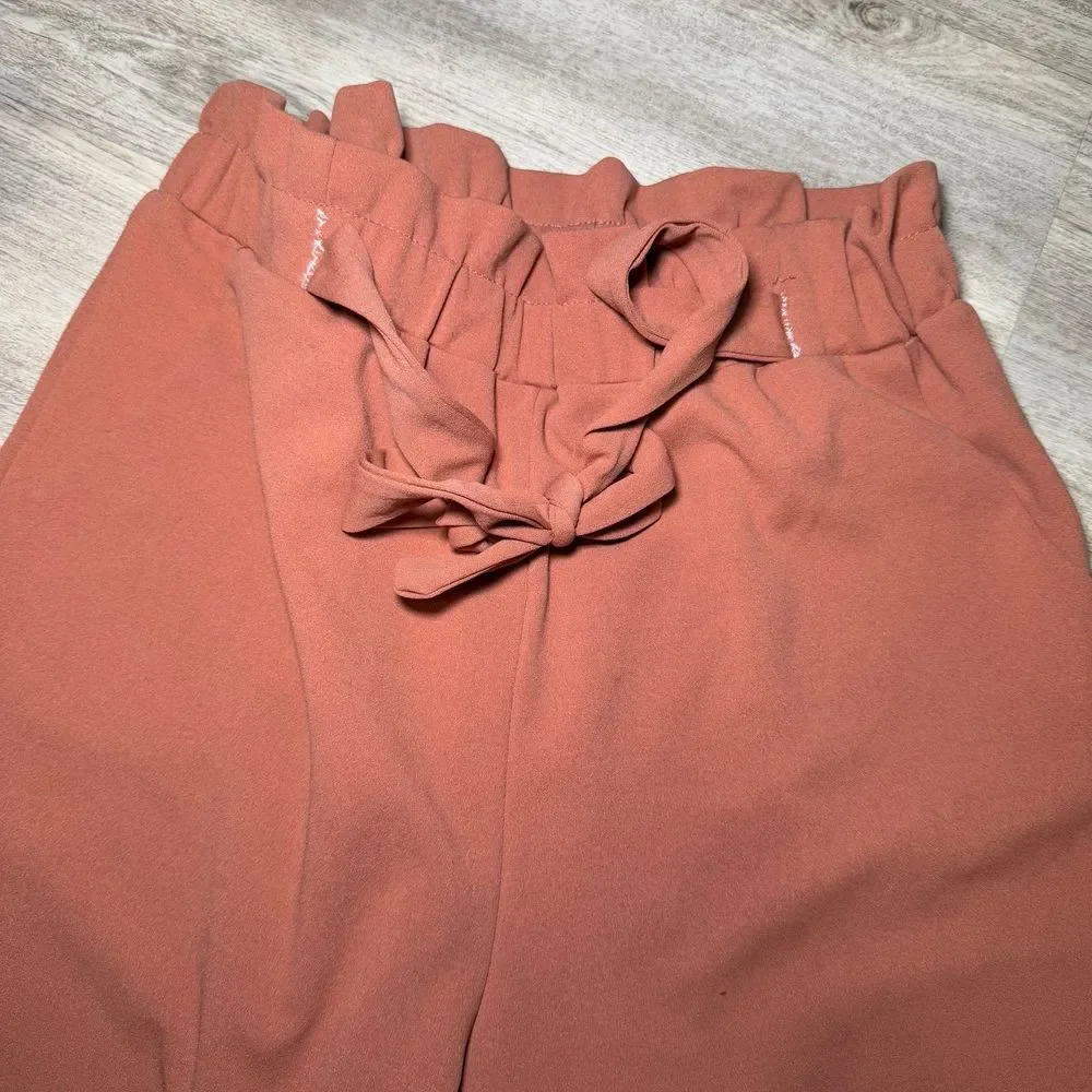 Soho Apperal brownish office pants size large 28 waist 26 length. In great condi